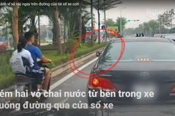 Phẫn nộ với hành vi xả rác ngay trên đường của tài xế ôtô