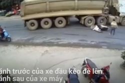 Xe máy đứng hình giữa đường, suýt bị xe đầu kéo chẹt qua
