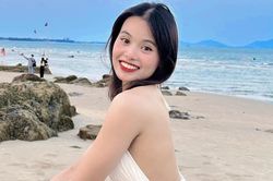 Không dự SEA Games 32, cung thủ Đỗ Thị Ánh Nguyệt đi du lịch thả dáng quyến rũ thướt tha trên biển