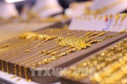 Giá vàng châu Á tăng chiều 25/4 khi đồng USD yếu đi