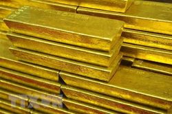 Giá vàng thế giới đi lên khi Fed tiếp tục tăng lãi suất