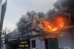 Dập tắt một vụ cháy gara ôtô và 2 vụ cháy rừng tại Hà Nội