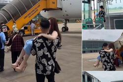 Cô gái đi cao gót được chồng bế lên máy bay, netizen tranh cãi