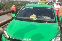 Nghi vấn vụ tài xế taxi nhảy cầu Thanh Trì tự tử