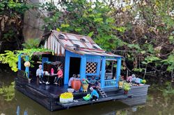 Tái hiện hồn quê miền Tây bằng những ngôi nhà thu nhỏ vạn người mê