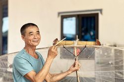 Giữ tiếng s&aacute;o diều tr&ecirc;n đất Song V&acirc;n