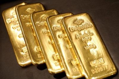 Giá vàng thế giới 5/2: Giảm khi USD tăng giá