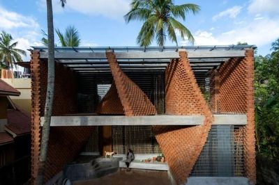 Kiến trúc sư của bùn và rác
