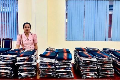 Khởi tố vụ án xâm phạm quyền tác giả, khởi tố bị can Hoàng Thị Bích Ngọc - In vải áo dài Đất Lành