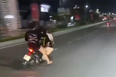 3 thiếu nữ đi xe máy lạng lách, đánh võng trên đường