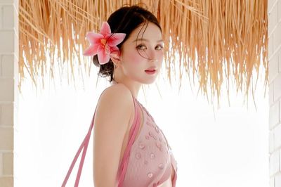 Lương Thùy Linh phản ứng khi Ngọc Trinh khoe ảnh áo tắm