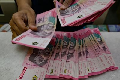 Nhà đầu tư ngoại ồ ạt bán tài sản Indonesia