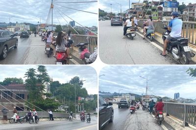 Người dân không nên tụ tập trên cầu xem nước lũ