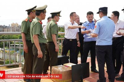 Bàn giao 30 đối tượng trong đường dây lừa đảo xuyên quốc gia