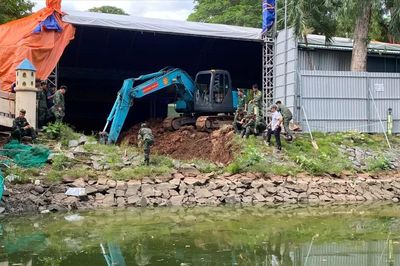 Di dời bia tưởng niệm, hút nước hồ để mở rộng tìm kiếm hài cốt liệt sĩ tại Công viên Lê Thị Riêng