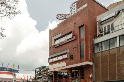 Không đập đi xây lại: quán trà Đà Lạt của xưởng xép thắng giải ArchDaily 2026