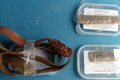 Phát hiện nhiều di vật, ảnh chân dung khi lấy mẫu ADN hài cốt liệt sĩ ở An Giang