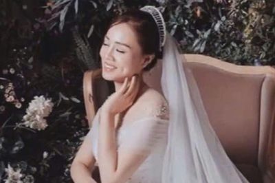 Vợ NSND Công Lý công khai ảnh mặc váy cưới