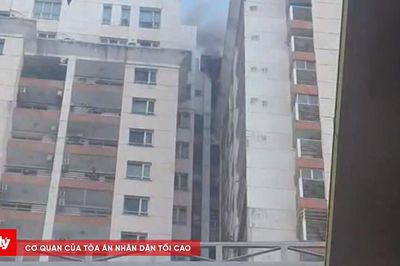 Cháy cao ốc, 2 người thoát nạn kịp thời