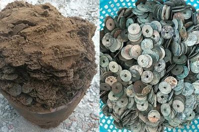Đào móng xây nhà phát hiện chum tiền xu nặng gần 1 yến
