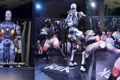 Màn so găng đầu tiên trên thế giới giữa con người và robot trong lồng sắt