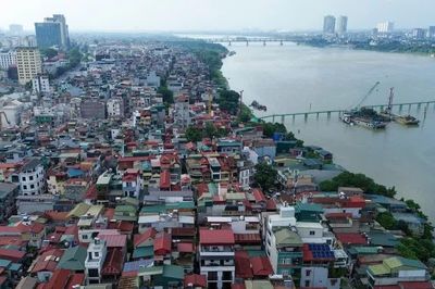 Việc bãi bỏ Quyết định số 6142 không đồng nghĩa với dừng quy hoạch phân khu đô thị sông Hồng