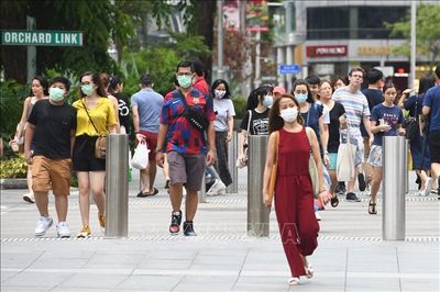 Singapore nhộn nhịp ngày đầu dỡ bỏ mọi hạn chế phòng dịch COVID-19