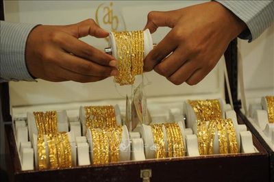 Giá vàng châu Á chiều 14/7 giảm khi đồng USD mạnh lên