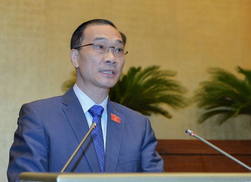 Ông Vũ Hồng Thanh trình bày báo cáo về việc thực hiện Chương trình mục tiêu quốc gia xây dựng NTM. Ảnh: Văn Bình