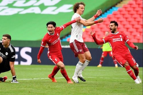 Takumi Minamino ghi bàn gỡ hòa cho Liverpool trong hiệp hai.