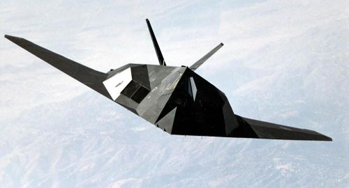 Trong một đợt ném bom ở vùng ngoại ô phía tây bắc thủ đô Belgrade của Nam Tư, một chiếc F-117 bay cùng với máy bay do phi công Heinlein điều khiển, khi còn cách mục tiêu ném bom khoảng 10 km thì bị trúng tên lửa, Heinlein đã thấy chiếc máy bay của đồng đội bị quầng lửa bao trùm.