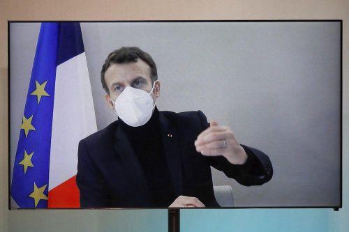 Tổng thống Macron phát biểu trong sự kiện bàn tròn của Hội nghị Nhân đạo Quốc gia (NHC), được tổ chức trực tuyến vào ngày 17/12. Ảnh: AP.