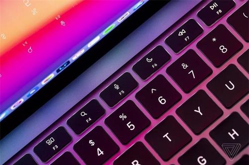 Hàng phím chức năng của MacBook Air mới có một vài nút bấm mới