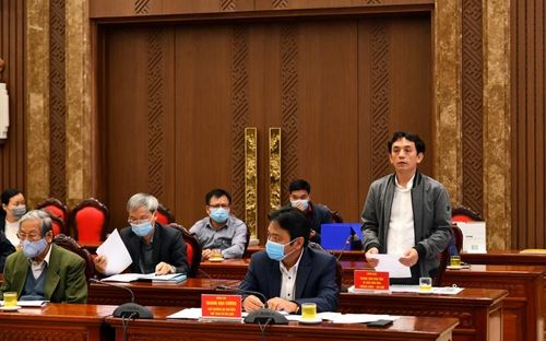 Giám đốc Trung tâm Bảo tồn Di sản Thăng Long - Hà Nội Trần Việt Anh báo cáo tại hội nghị. 