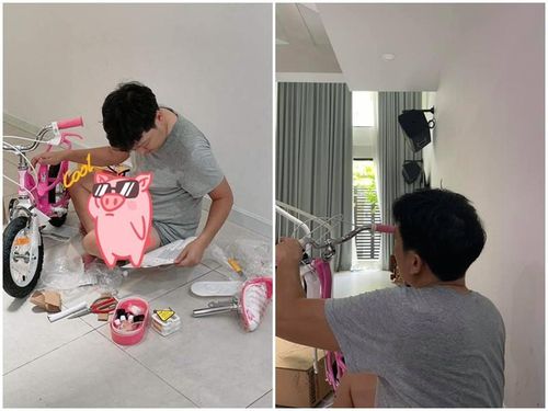 Ông xã của Nhã Phương chăm chú lắp chiếc xe đạp để con gái chơi vào dịp Lễ tình nhân.