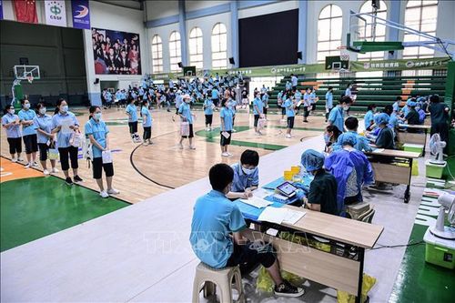 Một điểm tiêm vaccine ngừa COVID-19 tại tỉnh Liêu Ninh, Trung Quốc. Ảnh: AFP/TTXVN