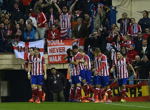 Atletico từng khiến AC Milan ôm hận ngay trên sân nhà. Ảnh: AFP.
