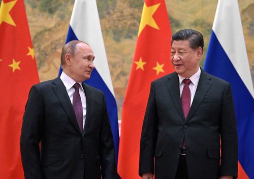 Tổng thống Putin và Chủ tịch Tập Cận Bình gặp nhau ở Bắc Kinh. Ảnh: AFP.