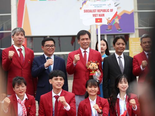Các thành viên đoàn thể thao Việt Nam thể hiện quyết tâm cống hiến, nỗ lực đạt thành tích cao nhất, vì sự thành công chung của đại hội do Việt Nam đăng cai.