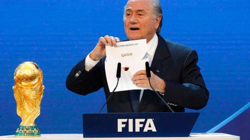 Cựu Chủ tịch FIFA Sepp Blatter công bố nước chủ nhà World Cup 2022 trong buổi lễ năm 2010. Ảnh: AP.