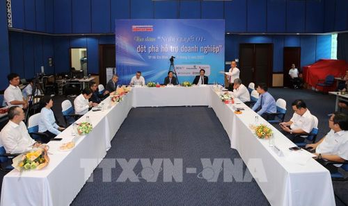 Tọa đàm Nghị quyết 01 – đột phá hỗ trợ doanh nghiệp. Ảnh: Hứa Chung - TTXVN