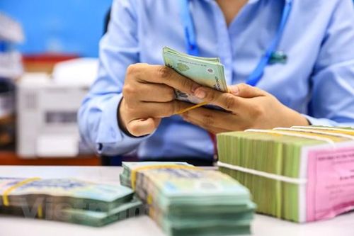  Một trong những mục tiêu mà chính sách tiền tệ hướng tới là hỗ trợ tăng trưởng kinh tế. (Ảnh: PV/Vietnam+)