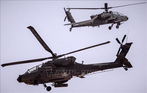 Trực thăng AH-64 Apache của quân đội Mỹ tham gia cuộc tập trận ở Tan-Tan, Maroc, ngày 30/6/2022. Ảnh (tư liệu): AFP/TTXVN