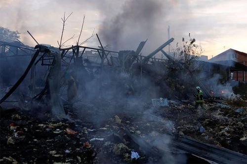Các hình ảnh Kiev bị tấn công tên lửa ngày 21/9. Ảnh: Reuters