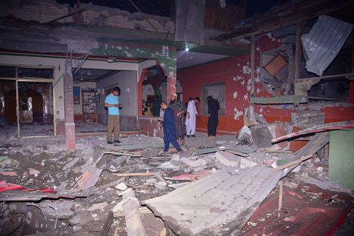 Một tòa nhà ở vùng đất thuộc Kashmir do Pakistan quản lý tan hoang sau vụ tấn công của Ấn Độ. (Ảnh: AP)