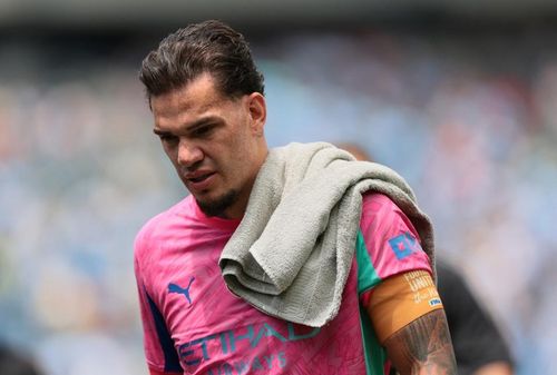 Ederson muốn ở lại Man City. Ảnh: Reuters.