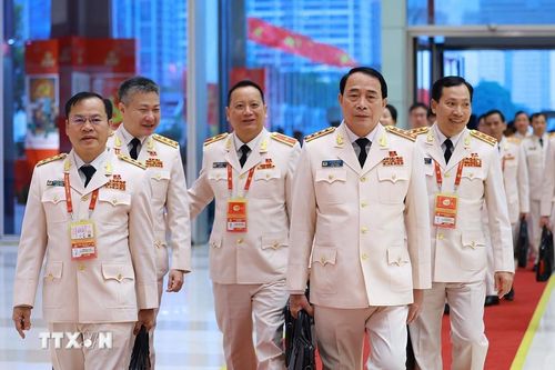 Các đại biểu đến dự ngày làm việc chính thức thứ ba Đại hội XIV của Đảng, sáng 22/1. (Ảnh: TTXVN)