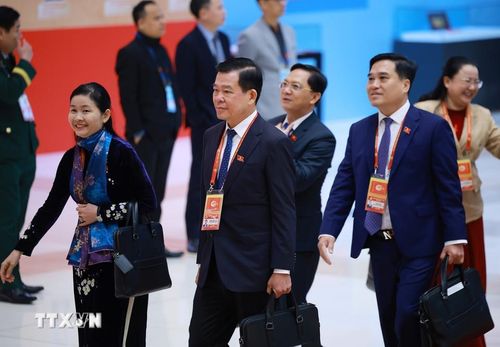 Các đại biểu đến dự ngày làm việc chính thức thứ ba Đại hội XIV của Đảng, sáng 22/1. (Ảnh: TTXVN)