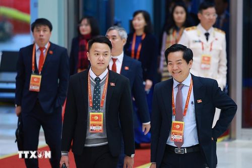 Các đại biểu đến dự ngày làm việc chính thức thứ ba Đại hội XIV của Đảng, sáng 22/1. (Ảnh: TTXVN)