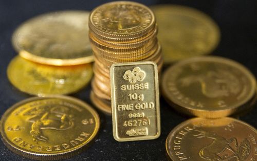 Giá vàng thế giới hiện dao động dưới vùng 5.200 USD/ounce. Ảnh: Reuters.